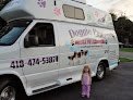 Negocio Doggie Paws Mobile Pet Grooming, Llc