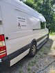 Negocio Howl We Roll Mobile Pet Grooming